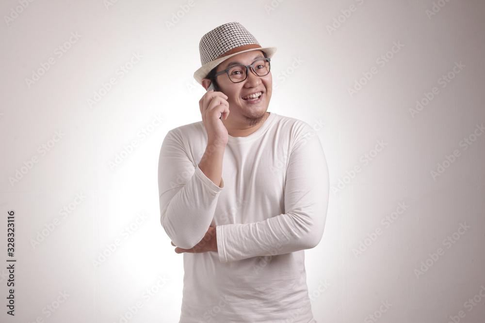 Young Man Talking on his Phone, Happy Smiling Laughing Young Man Talking on his Phone, Happy Smiling Laughing