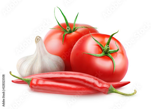 Isolated arrabbiata sauce ingredients. Two fresh tomatoes, red hot peppers and a head of garlic isolated on white background with clipping path