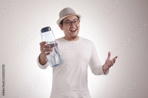 Healthy Man Drink Mineral Water in Bottle