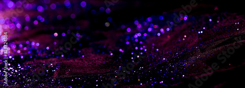 bokeh purple glitter texture christmas abstract background or with blank space photo