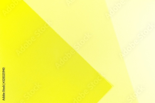 Yellow background. Three separate shades of the yellow
