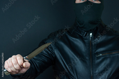 knife in the masked bandit's hand