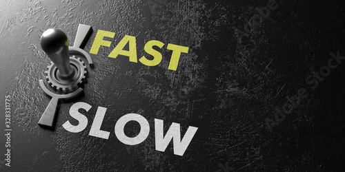 Fotografija Old vintage switch Fast slow on metal black background