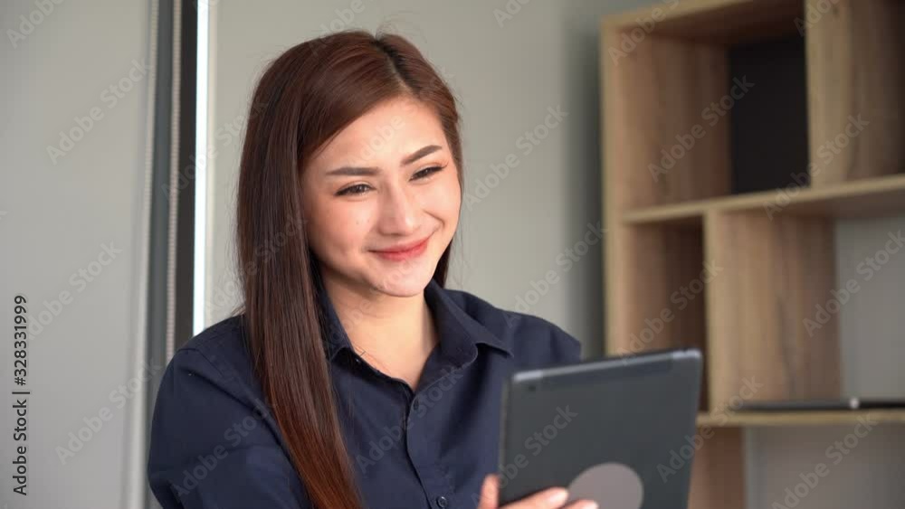 4k video of asien Business women Video Conferencing With Co-worker by Digital tablet in the modern modern office. 4k video of asien Business women Video Conferencing With Co-worker by Digital tablet in the modern modern office.