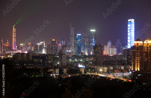 Shenzhen with illumination and flashing lasers © Yan