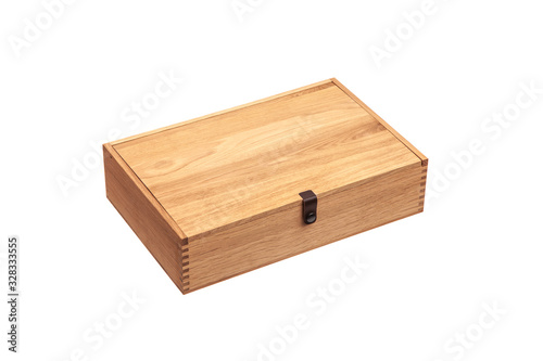 Wooden box with a lid isolate on a white back. Packaging for an expensive gift. New box made of light wood.