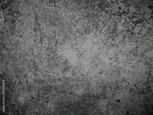 Rough dark grey concrete wall background