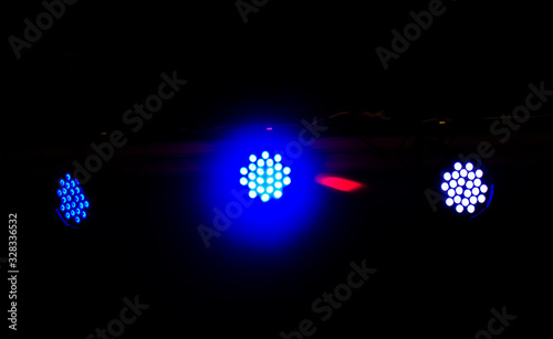 colored led club lights on black background