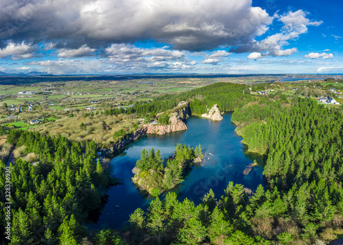 The disused Carrigfoyle quarry in Barntown, County Wexford, is a popular scenic spot amongst locals. The high altitude offer a breathtaking view of the countryside.