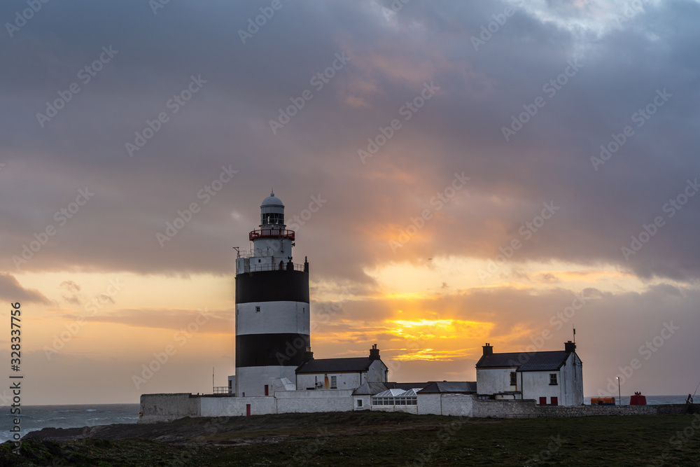 Hook Lighthouse at sunset, the worlds oldest lighthouse is located in the south east of Ireland in Co Wexford.