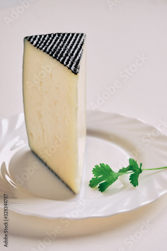 Wallpaper Mural Wedge of semi-cured Manchego cheese Torontodigital.ca