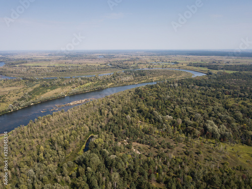 Aerial summer view to Desna river and forest