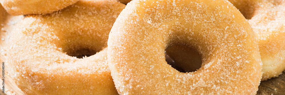 Classic doughnuts sprinkled with sugar. Banner for the site