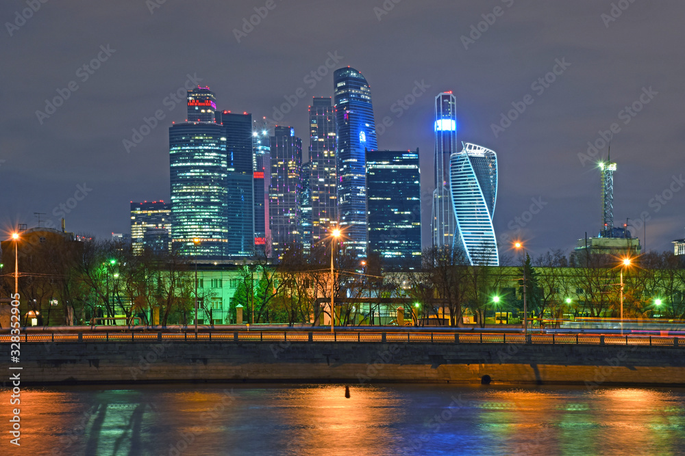 Obraz premium High-rise buildings of the Moscow international business center Moscow-city on the Bank of the Moscow river. Construction started in 1998. Construction is in progress. Russia, Moscow, February 2020