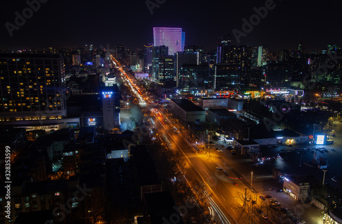 Chinese highway with traffic at Beijing buildings 