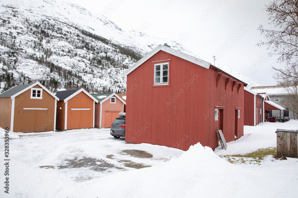 Winter and old wooden houses in the city by the river Vefsna. Mosjøen i Northern Norway