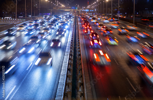 Chinese cars drive along huge highway in Beijing 