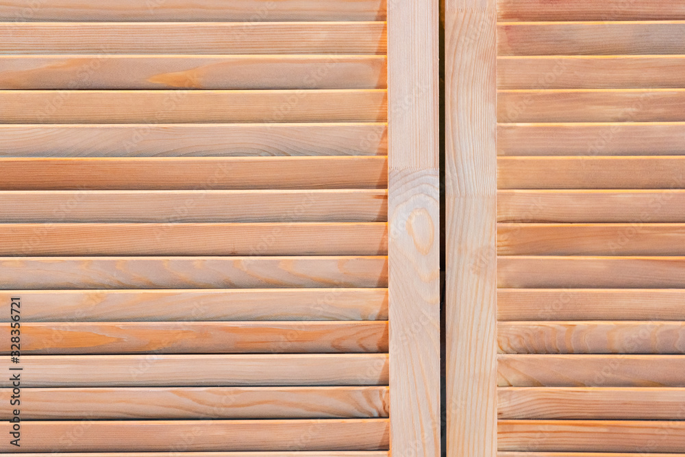 Wooden shutters on the window close-up. Wooden shutters on the window close-up.