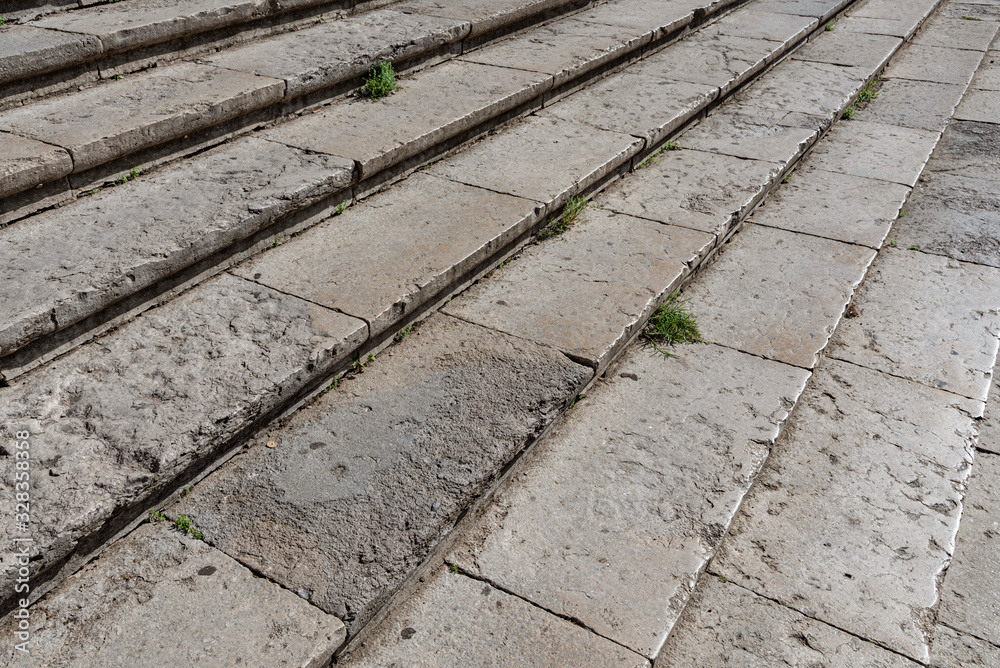 Obraz premium Old quarry stone steps. Stepping down in full frame