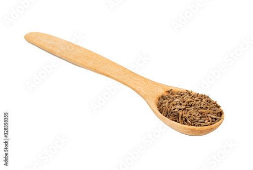 Dry cumin in spoon
