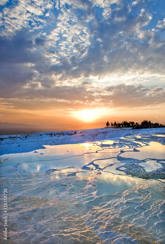 Carbonate travertines the natural pools during sunset  Pamukkale  Turkey - UNESCO HERITAGE