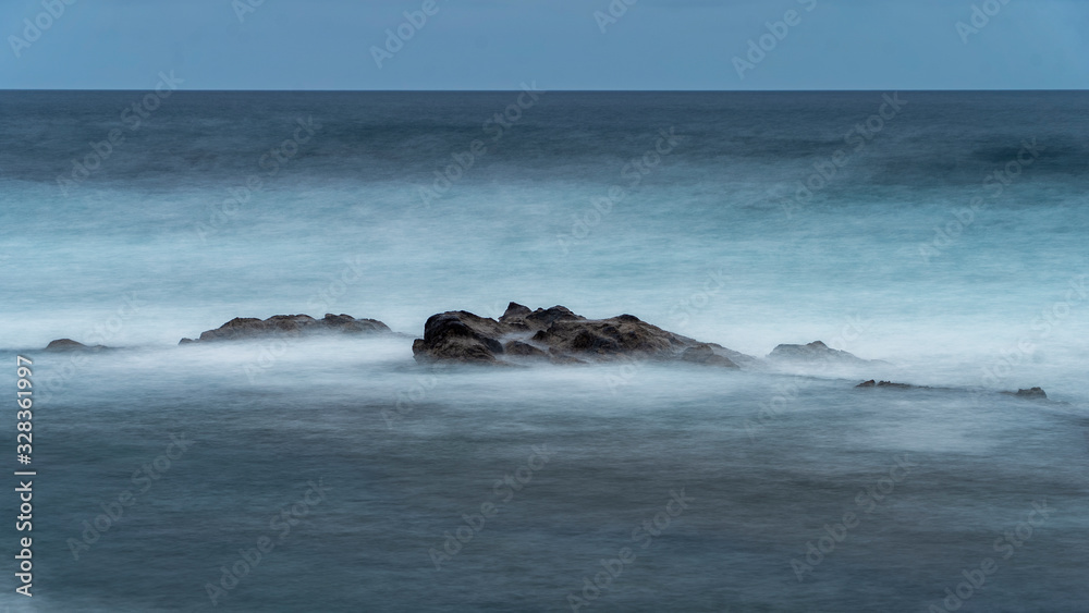 wild water on rocks in gran canaria