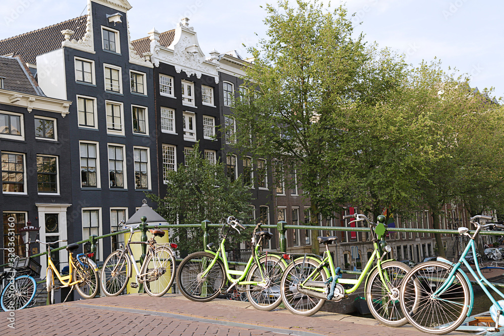 Panorama of beautifull Amsterdam bridge with bicycles,  Netherlands
