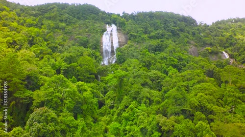 Aerial Shot Beautiful waterfall in the mountain. photo