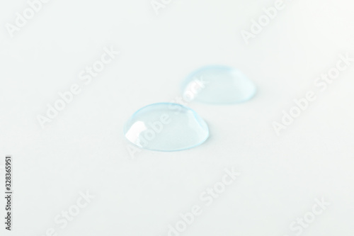 Contact lenses on white background  close up