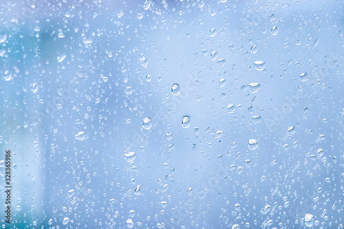 Rain drops on the glass. Wet window_ © Volodymyr