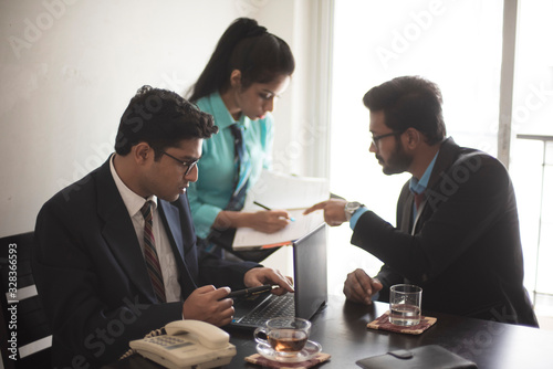 Corporate meetings between  young and energetic Indian Bengali bosses/officers/managers and secretary. Indian corporate lifestyle