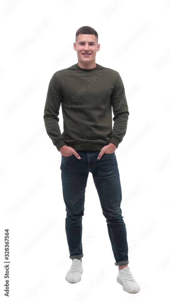 in full growth. smiling ordinary man in jeans in full growth. smiling ordinary man in jeans