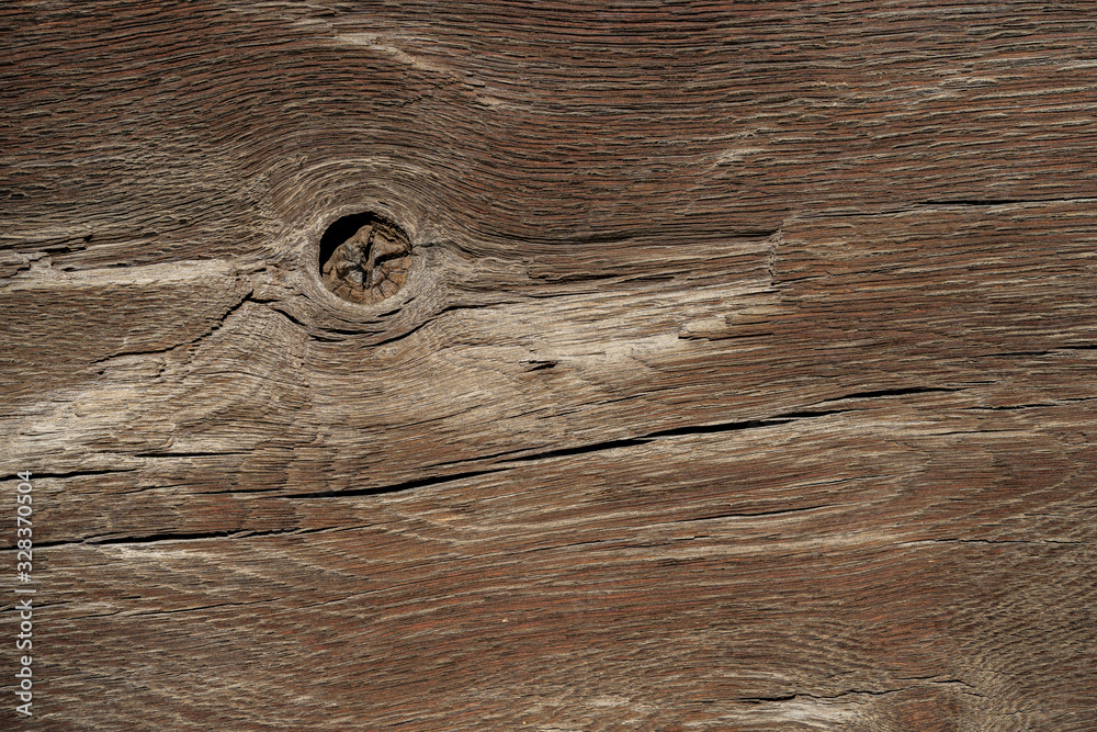 Naklejka premium Texture od wooden planks. Wall made of antique wood. Raw wood after century.