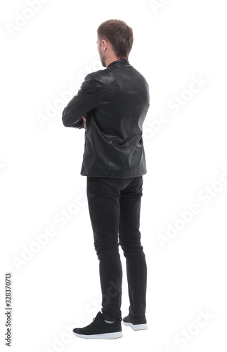 rear view. confident young man looking at white blank screen © ASDF
