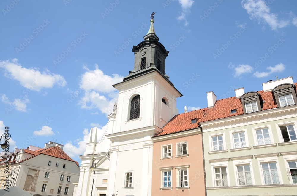 Church among buildings  in Warsaw, Poland