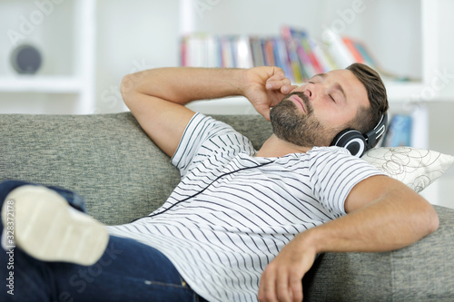 man is listening to music