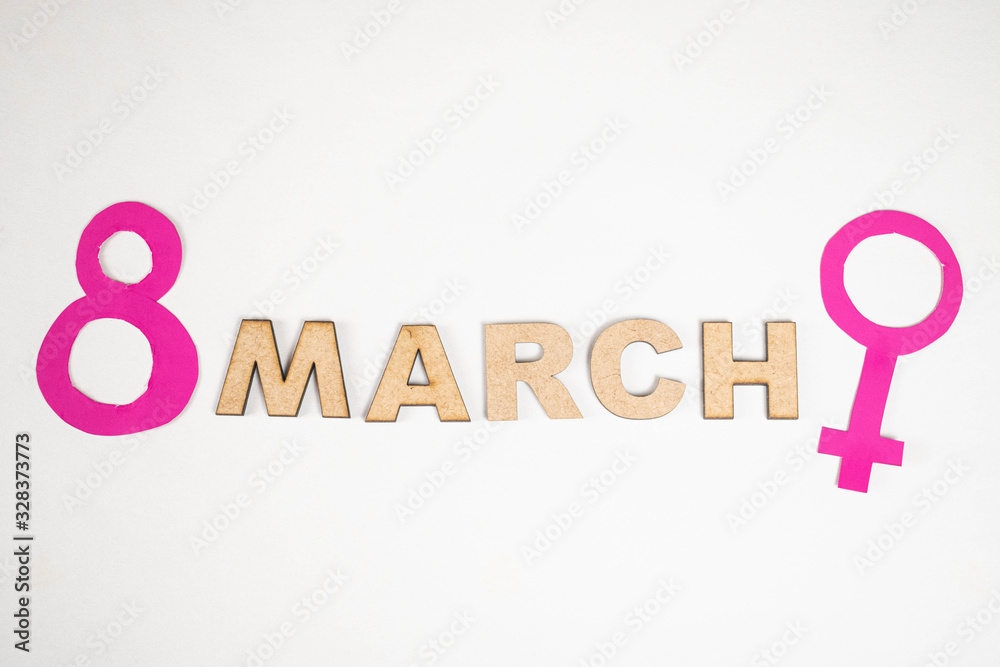 Φωτογραφία March made from wooden letters and number 8 and female gender symbol made of pink paper on white background