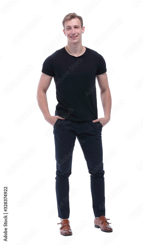 in full growth. confident guy with his hands in his pockets in full growth. confident guy with his hands in his pockets