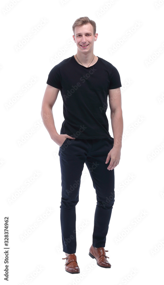 in full growth. confident guy with his hands in his pockets in full growth. confident guy with his hands in his pockets