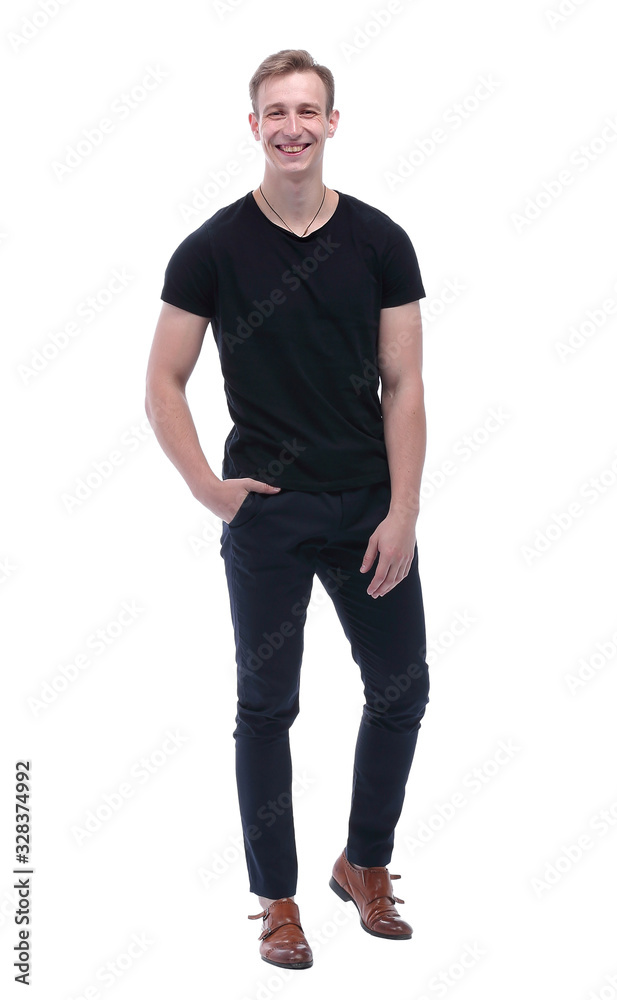 in full growth. confident guy with his hands in his pockets in full growth. confident guy with his hands in his pockets