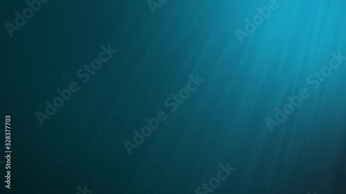 Seamless underwater background. Rays of light shining from above coming through the deep clear blue water.