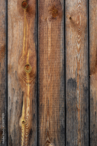 Texture od wooden planks. Wall made of antique wood. Raw wood after century.