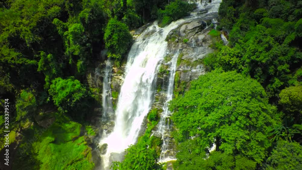 Aerial Shot Beautiful waterfall in the mountain. Aerial Shot Beautiful waterfall in the mountain.
