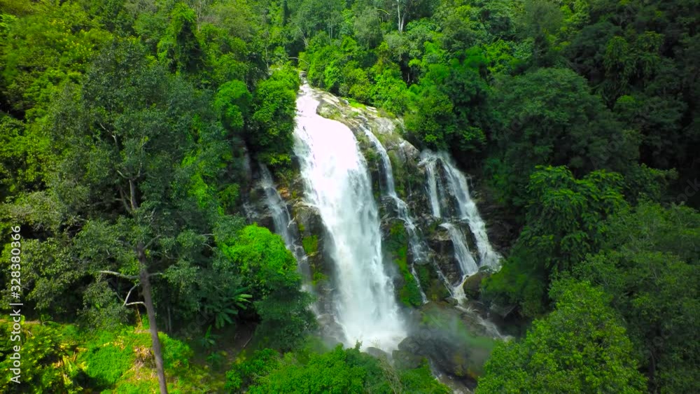Aerial Shot Beautiful waterfall in the mountain. Aerial Shot Beautiful waterfall in the mountain.