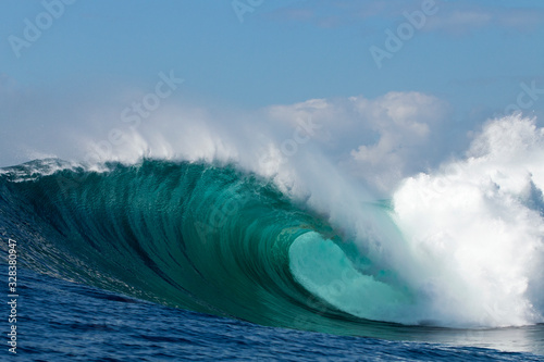Perfect big blue breaking wave