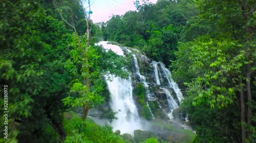 Aerial Shot Beautiful waterfall in the mountain. photo