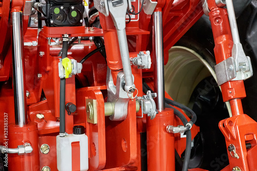 Closeup hydraulic control system for equipment on a tractor
