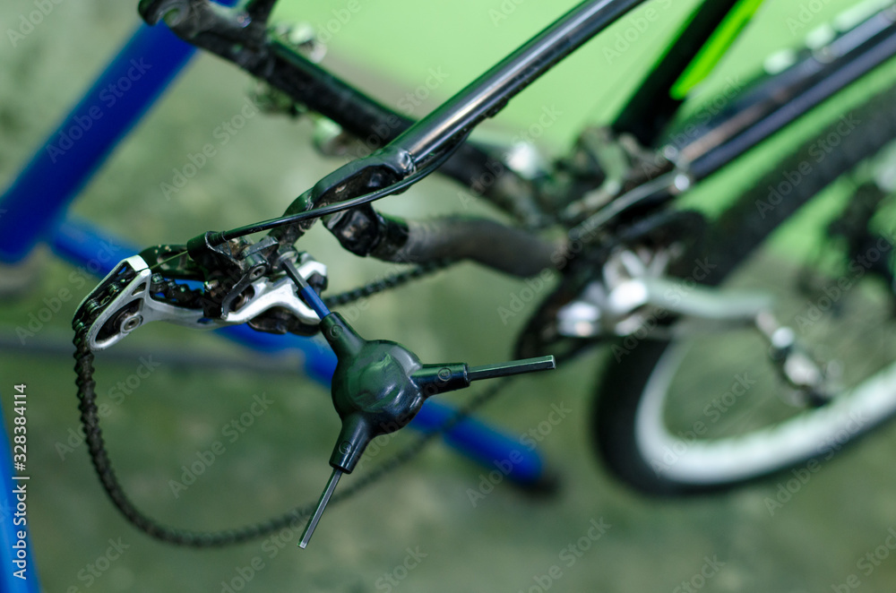 Bicycle repair, mechanic in the workshop. Modern mountain bike. Bicycle repair, mechanic in the workshop. Modern mountain bike.