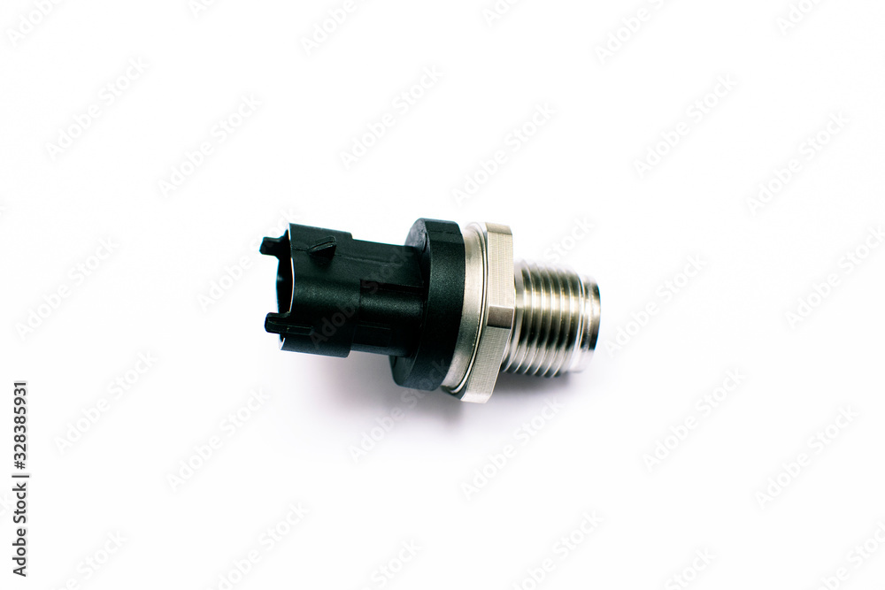 Fuel pressure sensor car isolated on a white background. Fuel pressure sensor car isolated on a white background.