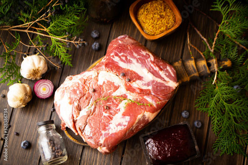 Photo Wild boar, Wild game meat. flat lay image